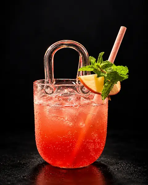 Apple and mint fizz in a handbag glass