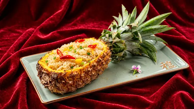 Pineapple fried rice served in the fruit