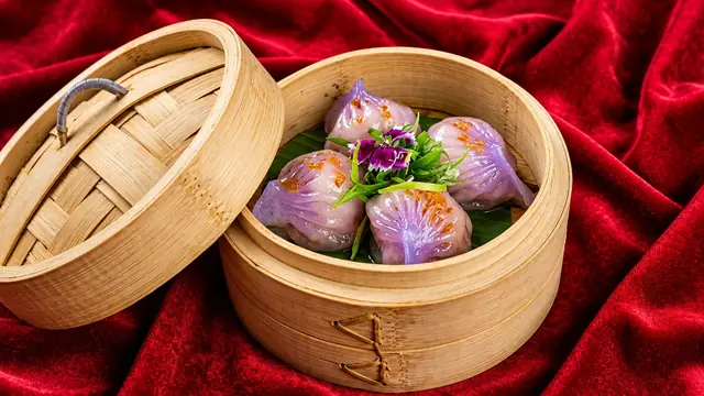 Purple yam prawn dumplings with crisp garlic