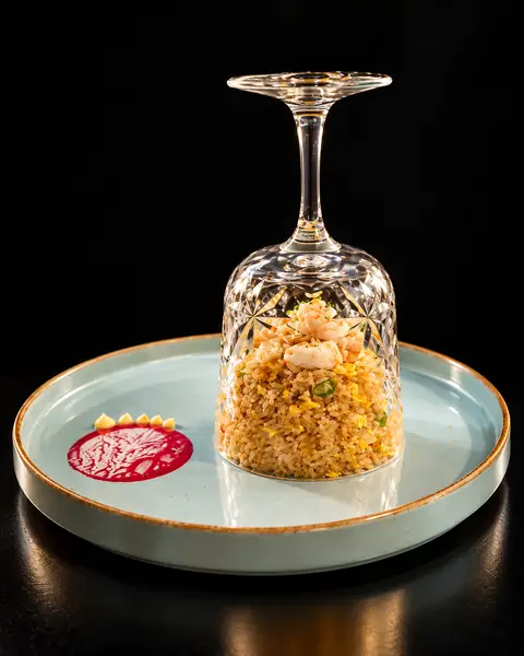 Prawn fried rice under a crystal cloche of smoke